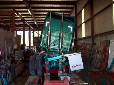 Big truck with twisted frame in the shop for repair